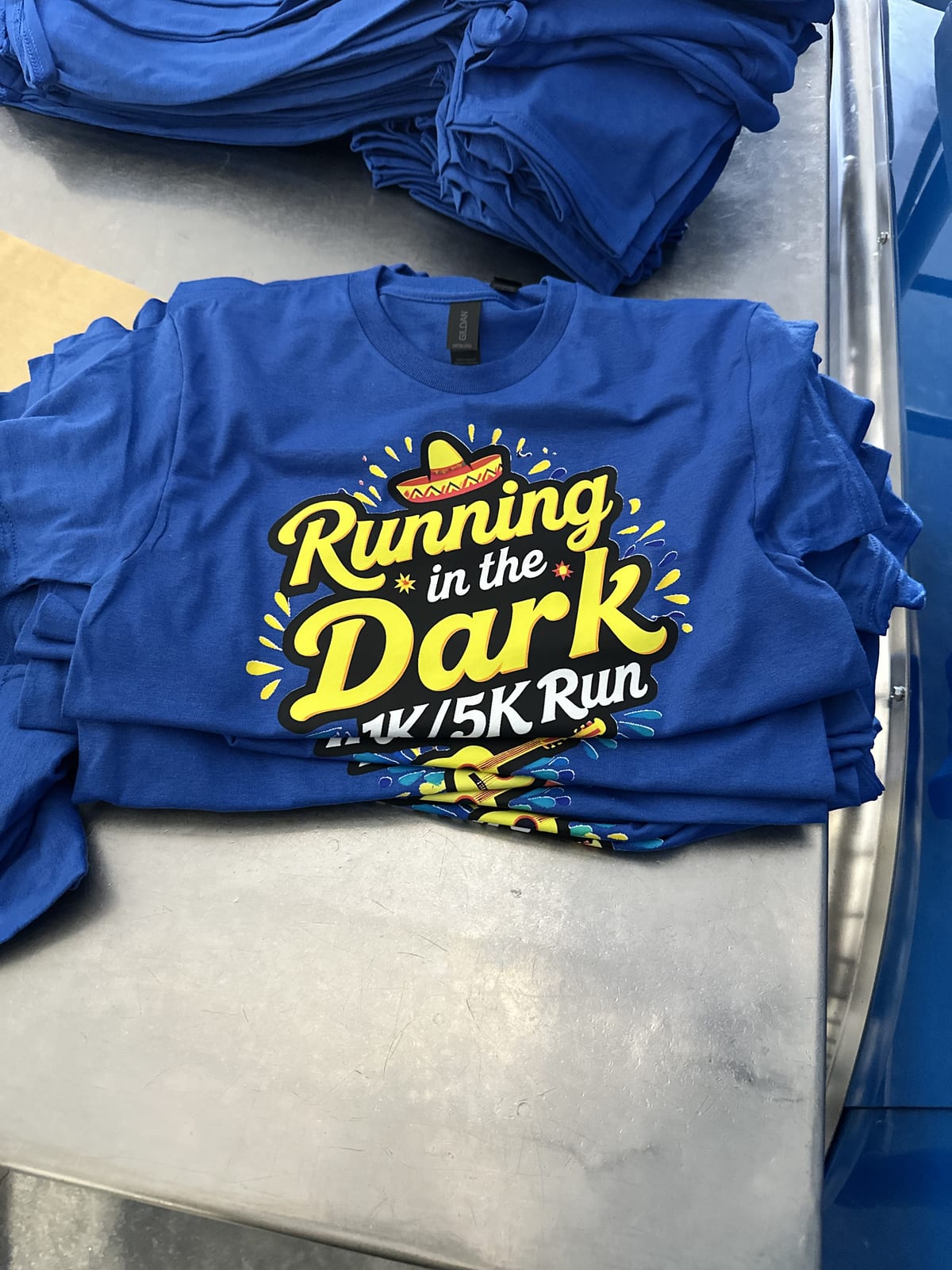 Bulk tee order, printed and folded