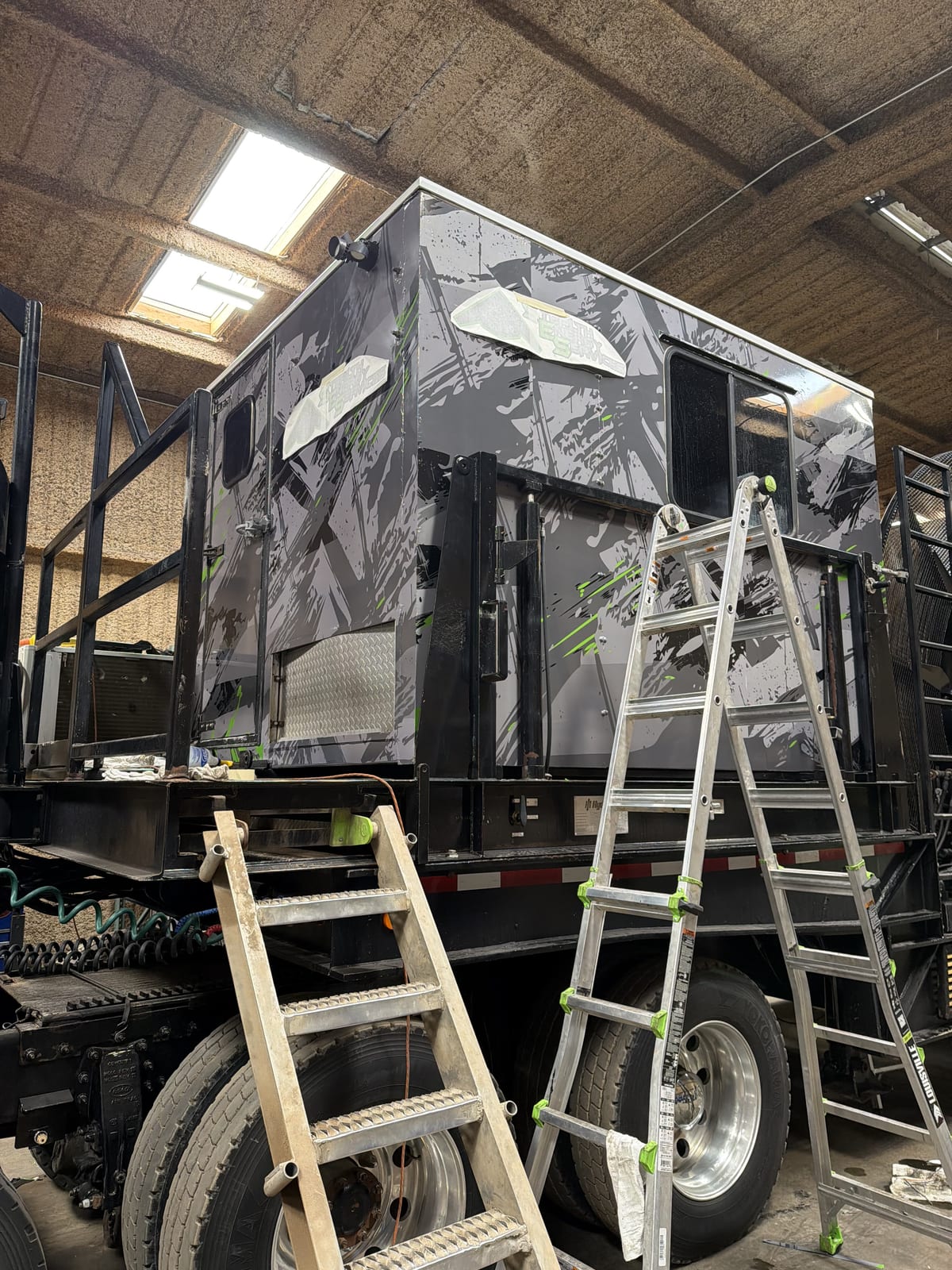 Mid-install: the camo film going onto the cab