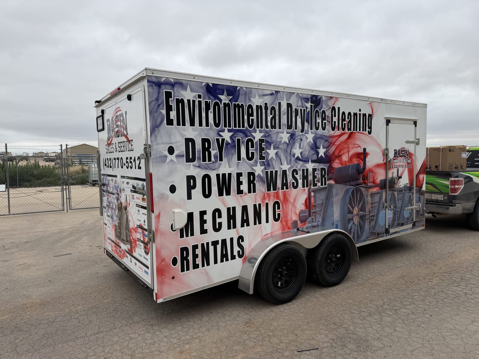 Fully wrapped Basin Sales and Service cargo trailer